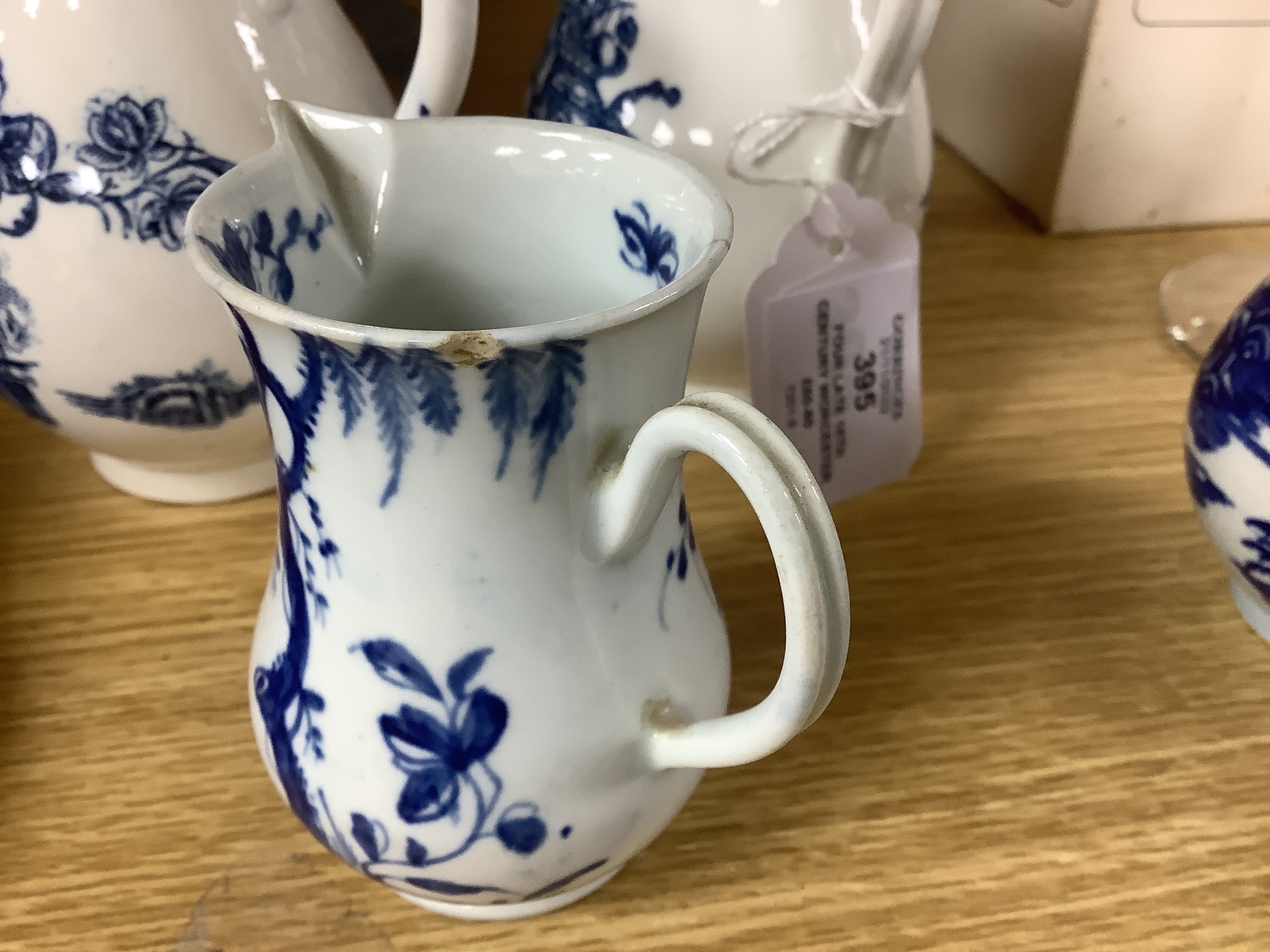 Four late 18th century Worcester blue and white sparrow beak jugs, tallest 12cm